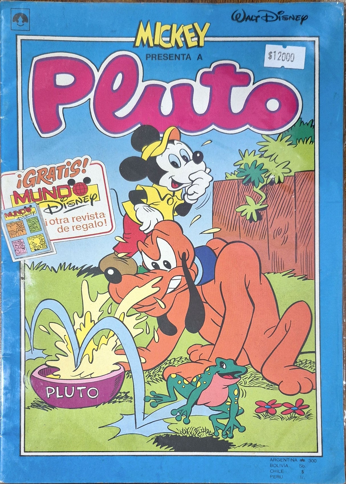 MICKEY PRESENTA A PLUTO - Revista