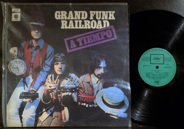 Grand Funk Railroad – A Tiempo - Vinilo de epoca edición Chilena