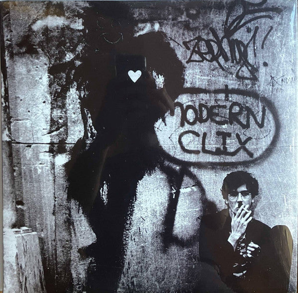 Charly Garcia  Clics Modernos - Vinilo Simple usado como nuevo.
